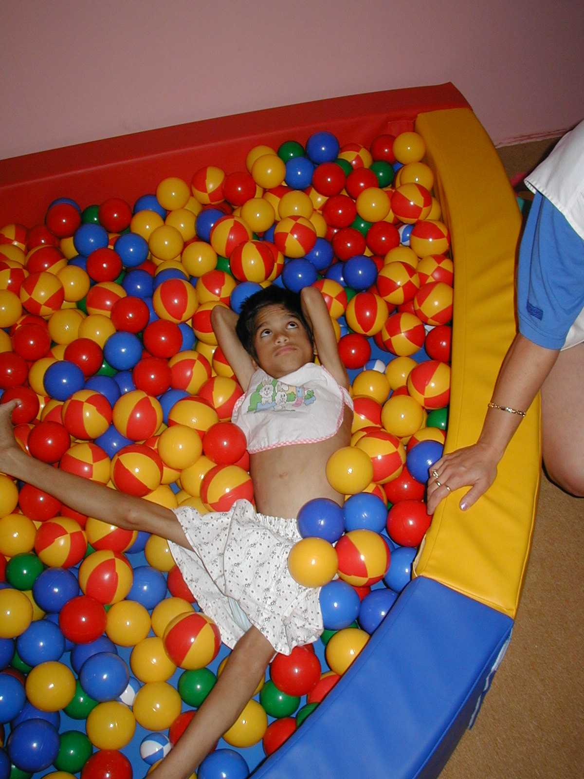 Therapy on plastic balls at Barcs, Hungary.